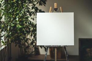 A large blank canvas on a metal stand displayed in a contemporary gallery space with neutral lighting and blurred background elements photo
