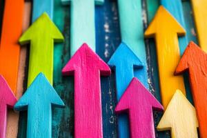 Colorful arrows pointing upward arranged artistically to signify growth and direction in a dynamic visual display photo