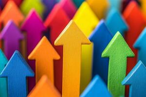 Colorful arrows pointing upward in a vibrant arrangement, symbolizing progress and direction in a cheerful art display photo