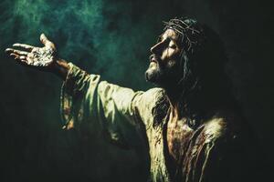 Jesus Christ depicted with outstretched arm and hand gestures symbolizing his crucifixion and resurrection photo