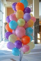 A stunning display of colorful pastel balloons for festive celebrations indoors photo