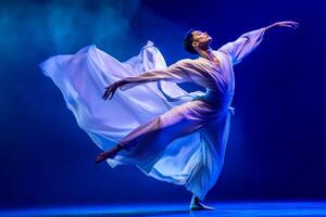 Contemporary dancer in mid-motion wearing a flowing outfit, captured with blurred effect and dramatic lighting on stage photo