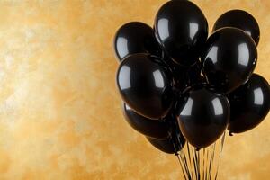 Black balloons showcasing discounts on a vibrant gold background with ample copy space for promotional text photo