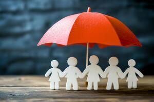 Happy family under red umbrella representing protection and insurance in a cozy setting photo