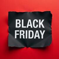 Promotional announcement for Black Friday sales with a torn black paper design on a vibrant red background photo
