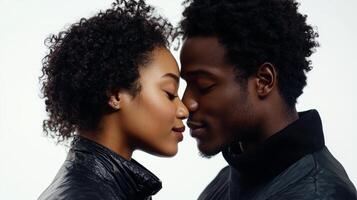 Romantic black couple sharing an intimate kiss and gazing into each other's eyes against a white background photo