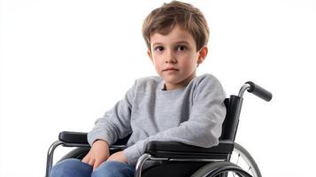 Cute young boy in a wheelchair poses for a studio portrait, showcasing resilience after a spine injury on a white background photo