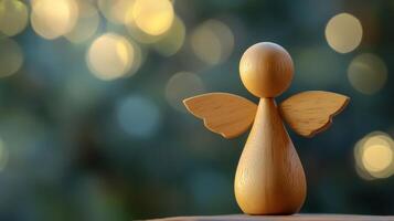 A handcrafted wooden angel figurine stands gracefully against a softly blurred bokeh background, capturing the essence of Christmas spirit photo