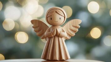 A charming wooden Christmas angel figurine illuminated by a gentle bokeh background, capturing the festive spirit of the holiday season photo