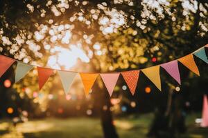 Festive outdoor event with colorful bunting flags creating a joyful ambiance during a sunny afternoon gathering in the park photo
