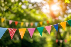 Colorful flags create a festive atmosphere at an outdoor event celebrating community spirit on a sunny day photo