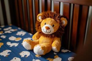 A cozy lion plushie resting in a baby crib in a nursery decorated for a little one photo
