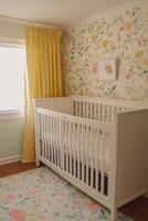 A serene nursery featuring a crib and beautiful floral wallpaper in a light and airy space photo