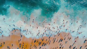 Aerial view Crowded beach, ocean waves, summer fun photo