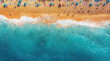 Aerial view of crowded beach, turquoise water, sunbathers, summer vacation photo