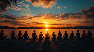 Sunset yoga group meditation beach serenity photo