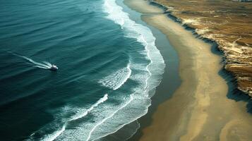 Coastal boat cruise, ocean waves, sandy shore, aerial view, travel photo