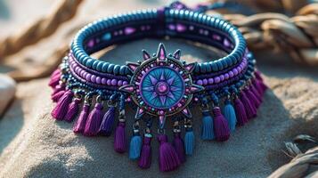 Bohemian choker necklace on beach sand photo