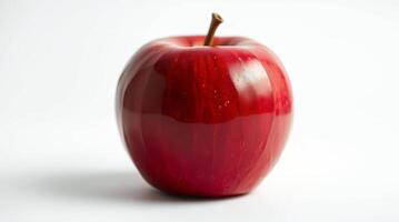 a red apple is shown on a black background photo