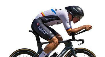 Professional cyclist intensely training for a time trial race on road bike photo