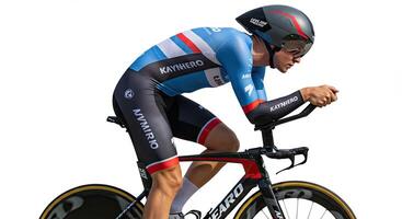 Time trial cyclist rides aerodynamic bike with helmet for competition photo
