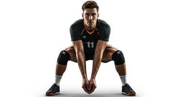 Volleyball player in ready position against white background in studio shot photo