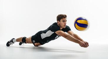 Volleyball player diving to save the ball with determination and focus on white background. photo
