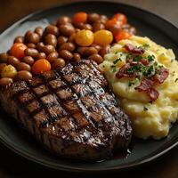 Grilled steak with mashed potatoes and colorful veggies makes a delicious meal photo