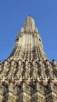 Close up of Wat Arun Temple Spire in Bangkok photo