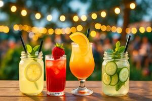 Three different types of drinks in mason jars on a wooden table photo