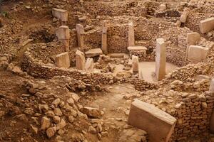 Archaeological site of Gobeklitepe with ancient stone structures showcasing early human civilization photo