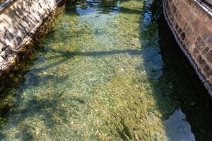 Fish lake in historic religous site in sanliurfa, Turkey photo
