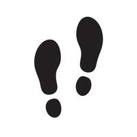 Isolated black footprints on a white background showing a walking pattern vector