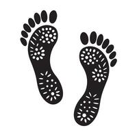 Two black footprints with floral patterns isolated on a white background vector