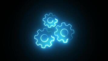 Illuminated blue gears in a dark setting, representing technology and innovation. video