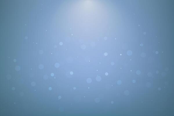 Light blue background with floating soft bokeh light dots