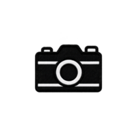 This is image of black and white camera icon with simple design, featuring circular lens in center. icon is likely used to represent photography or camera related applications png