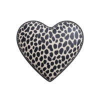 Heart shaped pillow with black and white spotted pattern, resembling animal print, is displayed against plain background. design is bold and stylish png
