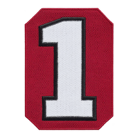 Red fabric patch with bold white number one outlined in black, symbolizing achievement or ranking. patch has octagonal shape and textured surface, often used for decoration or identification png