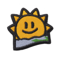Cheerful sun patch with smiling face and sun rays, set against simple landscape background, evokes sense of warmth and positivity png