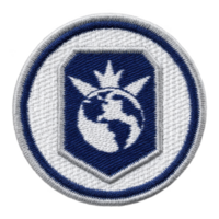 This features round embroidered patch with globe design and crown like symbol top, set against blue background with white border. patch conveys sense of global unity or leadership.globe design png