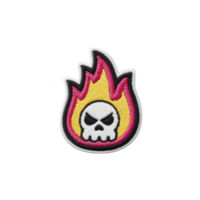 Colorful embroidered patch features skull with angry expression inside vibrant flame design, set against transparency background. patch has bold and edgy style png