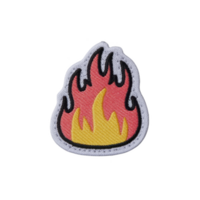 Colorful embroidered patch features flame design with red, orange, and yellow hues, outlined in black and white. patch is isolated on transparency background png