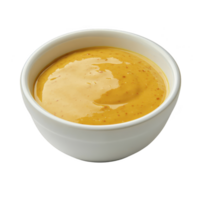 Small white bowl filled with creamy honey mustard sauce, showcasing smooth texture and rich golden color. sauce appears glossy and appetizing, perfect for dipping or dressing png