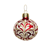 Red and gold Christmas ornament with intricate white and gold swirling patterns, featuring shiny finish and metal cap with loop for hanging png