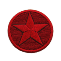 A red embroidered patch features prominent five pointed star design, symbolizing boldness and strength. circular patch is intricately stitched, showcasing craftsmanship and attention to detail png