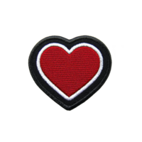 A red heart patch with white and black border, symbolizing love and affection, is displayed on transparent background. embroidered design is simple yet striking png