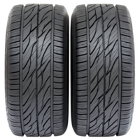 Two new car tires with detailed tread patterns are placed side by side, showcasing their robust design and durability. black rubber surface is clean and ready for installation png