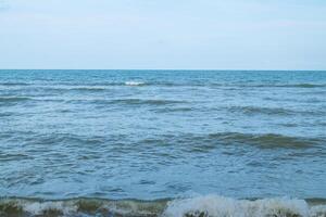 Ocean wave panorama view wide horizon beautiful nature and blue sky background in day time photo