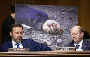 Senator Chris Murphy (D-CT), left, and Senator Chris Coons (D-DE) listen as Secretary of State Marco Rubio testifies in front of the Senate Committee on Foreign Relations in Washington, D.C., on May 20, 2025. editorial_image